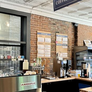 Daylily - a coffee shop with a brick wall - Delis Near Me - Cincinnati, Ohio