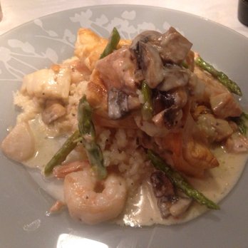 Noosa Bistro - Seafood Cobbler; a pot pie like dish with generous chunks of scallops, shrimp & salmon in a creamy vegetable sauce! - Seafood Near Me - Mentor, Ohio