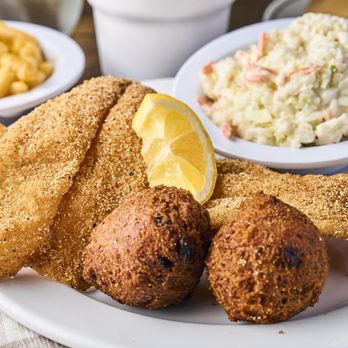 Matthews Cafeteria - Fried catfish served with hushpuppies. Pairs great with coleslaw and mac and cheese. - Southern Near Me - Tucker, Georgia Matthews Cafeteria - Fried catfish served with hushpuppies. Pairs great with coleslaw and mac and cheese. - Southern Near Me - Tucker, Georgia