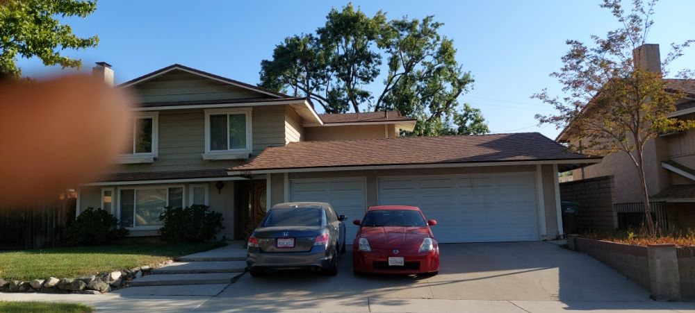 Slide of A. L. Follett Roofing