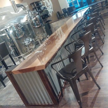 Ascension Brewing Company - The brewing area looks like it is pre-set up for future brewing classes. For now, you get a front row seat to them brewing. - Brewpubs Near Me - Novi, Michigan Ascension Brewing Company - The brewing area looks like it is pre-set up for future brewing classes. For now, you get a front row seat to them brewing. - Brewpubs Near Me - Novi, Michigan
