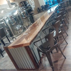 Ascension Brewing Company - The brewing area looks like it is pre-set up for future brewing classes.  For now, you get a front row seat to them brewing.