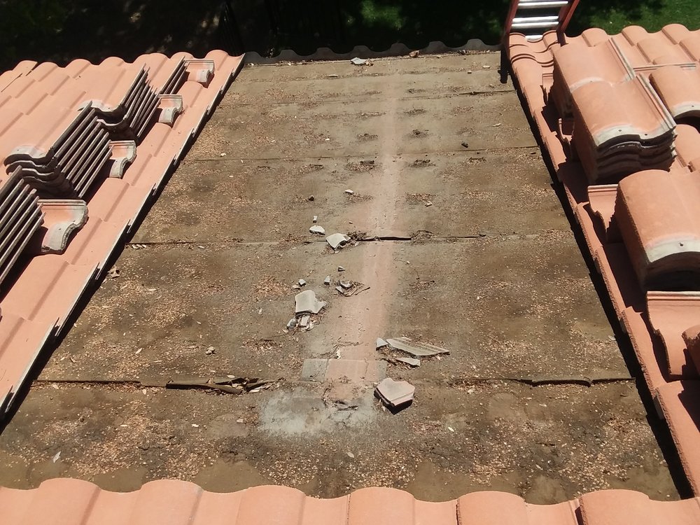 Slide of A. L. Follett Roofing