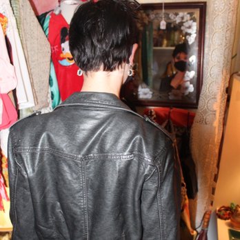 Corona Antique Gallery - One of their clothing sections with cute vintage items - Antiques Near Me - Corona, California