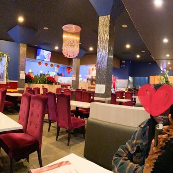 Shooting Star Cafe - a woman with a paper heart on her face - Desserts Near Me - Oakland, California Shooting Star Cafe - a woman with a paper heart on her face - Desserts Near Me - Oakland, California