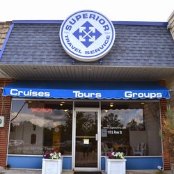 Superior Travel Service - Downtown Fenton across from the Fenton Community Center. Our building faces the river.