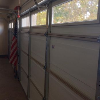 ETC Garage Doors - Adding the windows really brightened the inside of the garage. - Garage Door Services Near Me