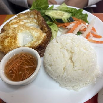 UK Pho Vietnamese Cuisine - Rice plate, with grilled pork which was covered by the egg - Vietnamese Near Me - Glendale, Arizona UK Pho Vietnamese Cuisine - Rice plate, with grilled pork which was covered by the egg - Vietnamese Near Me - Glendale, Arizona