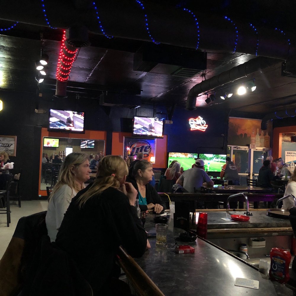 Jimbo's 2.0 Pub & Eatery - a group of people sitting at a bar - Sports Bars Near Me - Anderson, Indiana Jimbo's 2.0 Pub & Eatery - a group of people sitting at a bar - Sports Bars Near Me - Anderson, Indiana