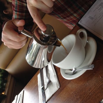 Cafe Jolie - Pouring a French Press. - Breakfast & Brunch Near Me - Alameda, California