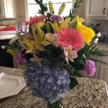 Flowers By Freddie - While "cute" it certainly isn't what I requested, appropriate for a sympathy arrangement or worth $90. - Florists Near Me - Newnan, Georgia