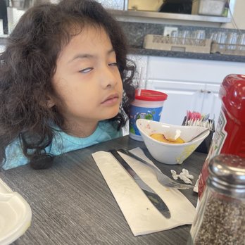 Hot Off The Griddle - My kiddo eating the remaining fruit lol. - Breakfast & Brunch Near Me - Orangevale, California Hot Off The Griddle - My kiddo eating the remaining fruit lol. - Breakfast & Brunch Near Me - Orangevale, California