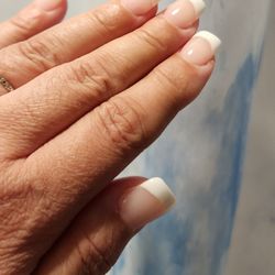Philly's Nail & Spa - Beautiful fill job after a month, done with regular and white acrylic. Thanks, Tram!