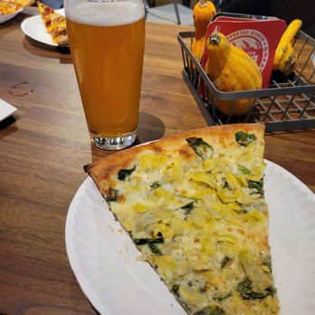 Pat's Tap - Grab a yummy slice of pizza  at Boss Lady next door to enjoy with your beer - Beer Bar Near Me - Superior, Colorado