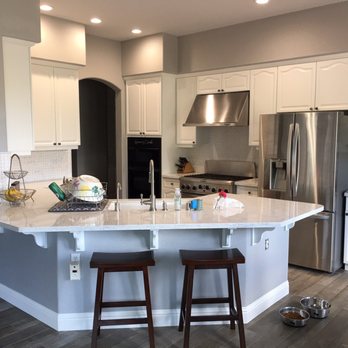 Northern Counties Construction - We had the cabinets painted, new floors, counter tops, and backsplash. - General Contractors Near Me Northern Counties Construction - We had the cabinets painted, new floors, counter tops, and backsplash. - General Contractors Near Me