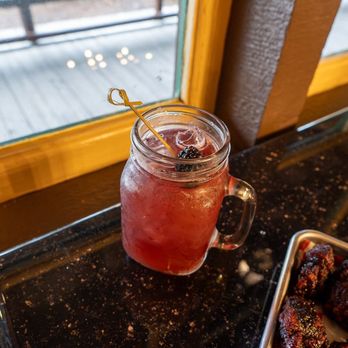Crockett's Tavern - Bear-y Buckle (Vegan) Uncle Nearest Whiskey, Pure Cane Sugar, Lemon Juice, Bitters, Fever-Tree Ginger Beer, and Muddled Blackberries - Bars Near Me - Lake Buena Vista, Florida Crockett's Tavern - Bear-y Buckle (Vegan) Uncle Nearest Whiskey, Pure Cane Sugar, Lemon Juice, Bitters, Fever-Tree Ginger Beer, and Muddled Blackberries - Bars Near Me - Lake Buena Vista, Florida