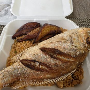 West African Cuisine - Jollof rice with fried red snapper - Caribbean Near Me - Phoenix, Arizona West African Cuisine - Jollof rice with fried red snapper - Caribbean Near Me - Phoenix, Arizona