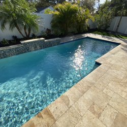 Ultimate Pool Remodel - Pool remodel with travertine pool deck and coping, new water feature, new tile