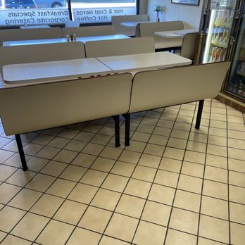 New Country Deli - a row of tables in a store - Delis Near Me - Syosset, New York New Country Deli - a row of tables in a store - Delis Near Me - Syosset, New York