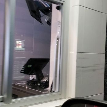 Dunkin' -  a view of an airplane through a window - Coffee & Tea Near Me - Pingree Grove, Illinois
