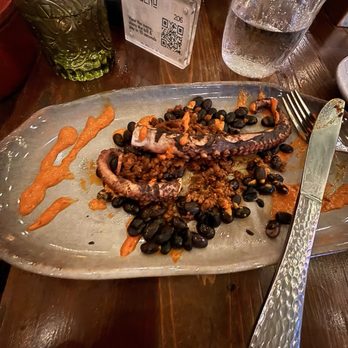 El Sueño - Octopus legs with chorizo and beans. - Mexican Near Me - San Diego, California El Sueño - Octopus legs with chorizo and beans. - Mexican Near Me - San Diego, California
