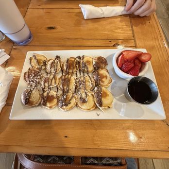 Cielo Cafe - Mini pancakes with Nutella, powdered sugar, syrup, and strawberries - Coffee & Tea Near Me - Wilmington, North Carolina