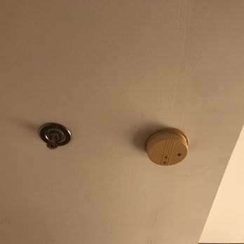 Exchange Building Apartments - A smoke stained smoke detector that may have been installed when Bush was president... - Apartments Near Me - Memphis, Tennessee Exchange Building Apartments - A smoke stained smoke detector that may have been installed when Bush was president... - Apartments Near Me - Memphis, Tennessee