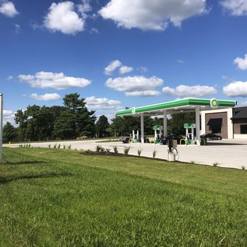 bp - a gas station with a gas station sign in the foreground - Gas Stations Near Me - West Branch, Iowa