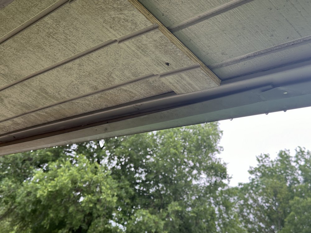 Slide of White Roofing and Construction