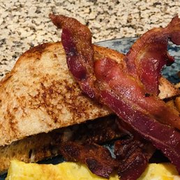Nice and buttered toast and crisp bacon Nice and buttered toast and crisp bacon
