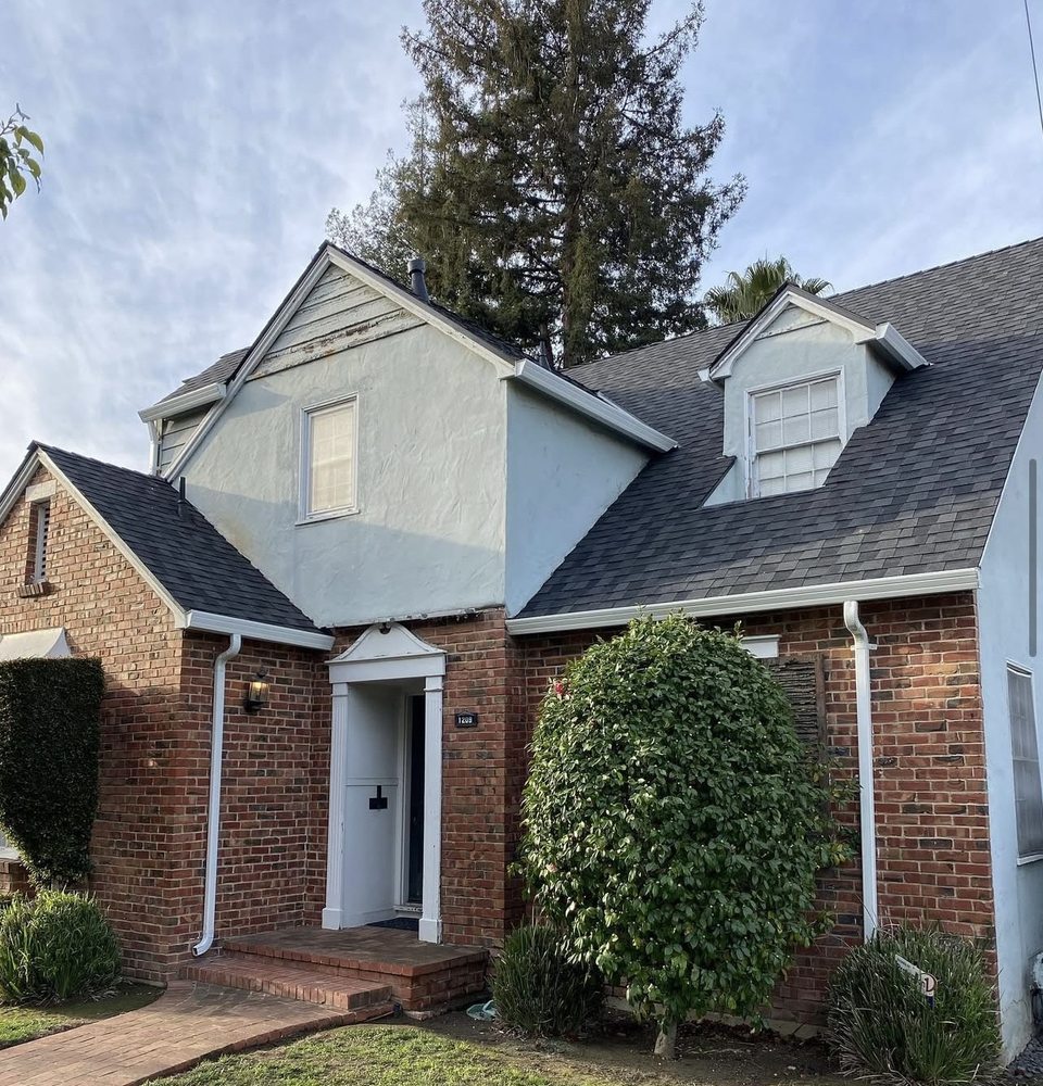 Slide of Exclusively Roofing