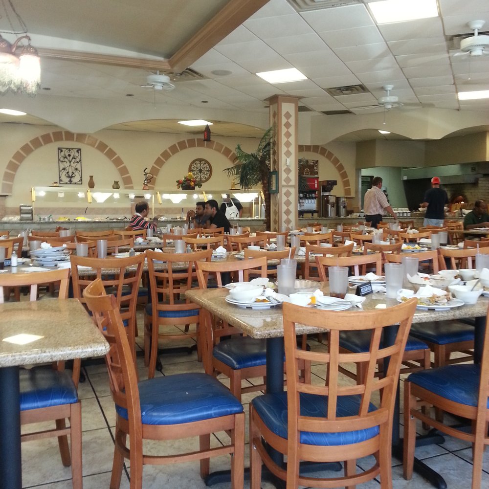 Dimassi's Mediterranean Buffet - Somebody rang the bell to get back to work. Look that all the plates! - Mediterranean Near Me - Richardson, Texas
