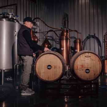 Sharpe Distillery - CEJ Mussell with freshly barrelled whisky - Distilleries Near Me - Cawston, British Columbia