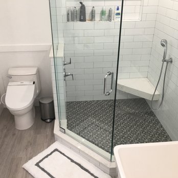 Construction Guaranteed - Corner shower with bench seat and oversize shampoo shelf. Toilet was moved to create thus large shower and soaking tub area. - General Contractors Near Me - San Jose, California Construction Guaranteed - Corner shower with bench seat and oversize shampoo shelf. Toilet was moved to create thus large shower and soaking tub area. - General Contractors Near Me - San Jose, California