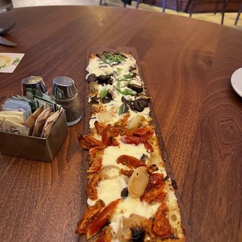 Seasons 52 - Half and half flatbread (half mushroom half roasted tomato) - New American Near Me - Burlington, Massachusetts