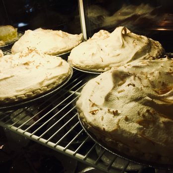 Brady's Restaurant - Tempting display of homemade pies with meringue toppings greet you at the counter... had to pass but it looked excellent! - American Near Me - Acme, Pennsylvania