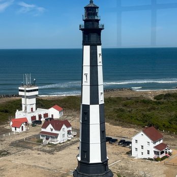 Cape Henry Lighthouse - New lighthouse and bay shot from the top of old lighthouse - Landmarks & Historical Buildings Near Me - Fort Story, Virginia
