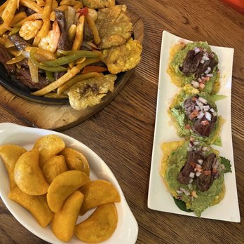 Noches De Colombia - Mini Empanadas Mar Y Tierra Salteado - Colombian Near Me - Mineola, New York Noches De Colombia - Mini Empanadas Mar Y Tierra Salteado - Colombian Near Me - Mineola, New York