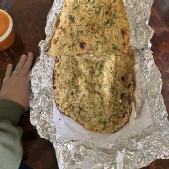 Farm Indian Eatery - a large flat bread - Indian Near Me - Hamilton, Ohio