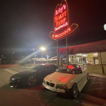 Arby's - two cars parked in front of a restaurant - Sandwiches Near Me - Huntington Beach, California Arby's - two cars parked in front of a restaurant - Sandwiches Near Me - Huntington Beach, California
