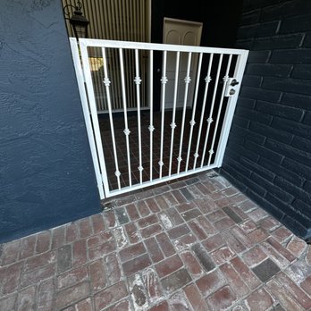 A's Arbor Care & Landscape - a white gate on a brick patio - Masonry/Concrete Near Me A's Arbor Care & Landscape - a white gate on a brick patio - Masonry/Concrete Near Me