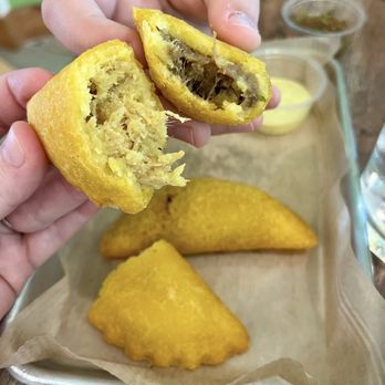 Acopio Caffee - Inside of both the chicken and beef empanadas. Very good. - Coffee & Tea Near Me - Naples, Florida
