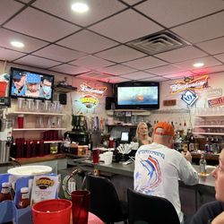 Buckett’s Wings and More - The name of bar