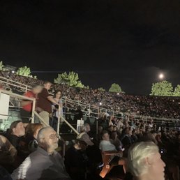 The flood light blasting everyone from the right of the stage