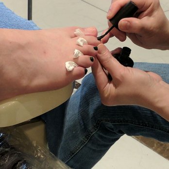 A Plus Nails - My Bear's toenails getting painted a manly camo green - Nail Salons Near Me - Rowlett, Texas