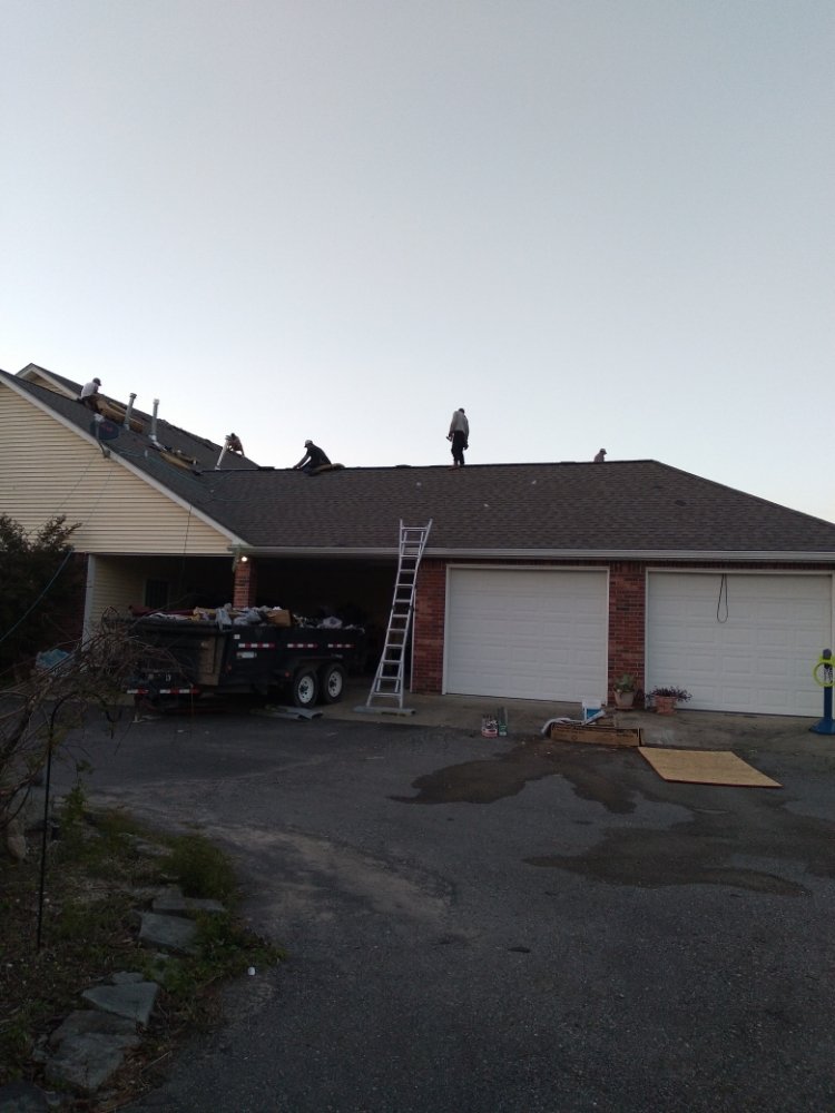 Slide of J&K Roofing Company