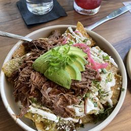 Chilaquiles verdes with birria Chilaquiles verdes with birria