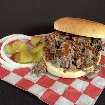 Uncle Bobs BBQ & Catering - a pulled pork sandwich - Barbeque Near Me - Conroe, Texas
