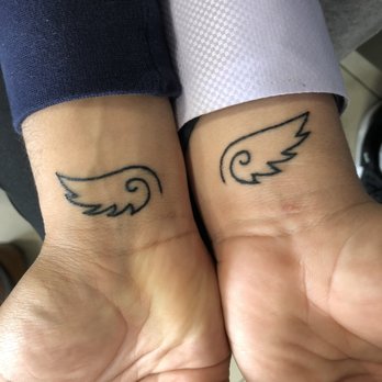 Ink Monkey Tattoo and Piercing - Completely different shapes of wing... very disappointed this is on me for life. - Piercing Near Me - Venice, California
