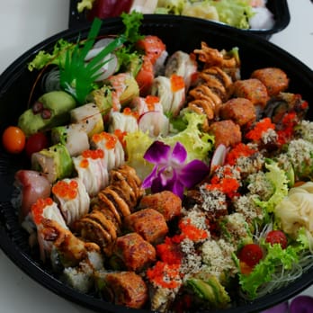 Ryo Sushi - I ordered a Party C for my roommates. The chef puts a wasab-made dragon head in the platter. What a Surprise! - Sushi Bars Near Me - Chicago, Illinois Ryo Sushi - I ordered a Party C for my roommates. The chef puts a wasab-made dragon head in the platter. What a Surprise! - Sushi Bars Near Me - Chicago, Illinois